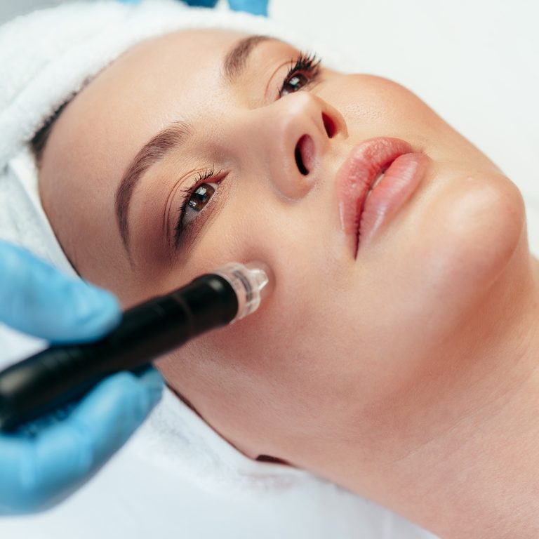 beautiful-woman-getting-facial-skincare-treatment-in-a-cosmetic-beauty-clinic.jpg