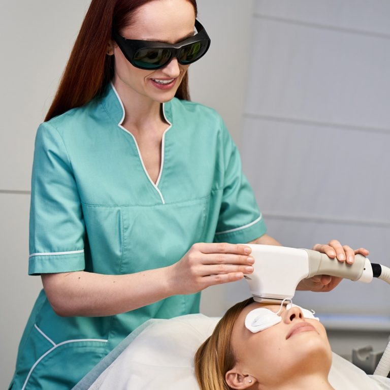beautiful-young-woman-receiving-a-dermatology-procedure-in-a-modern-clinic-setting.jpg